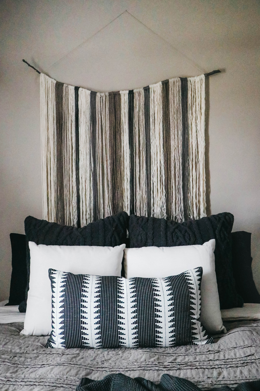 DIY Yarn Art | Earthy Boho Bedroom Makeover | Neutral Bedroom | Black, white, brown, gray bedroom | The Anastasia Co
