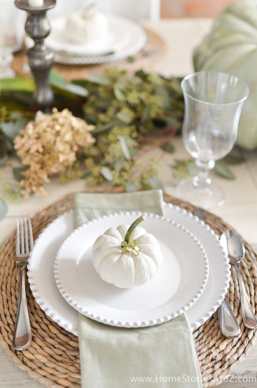 The secret to creating a full, finished Thanksgiving table? Layers. Layering the charger, dinner plate, salad plate, and a fun topper is a quick way to add visual depth and bring the table to life. Use a textured charger as the base to include a natural element.
