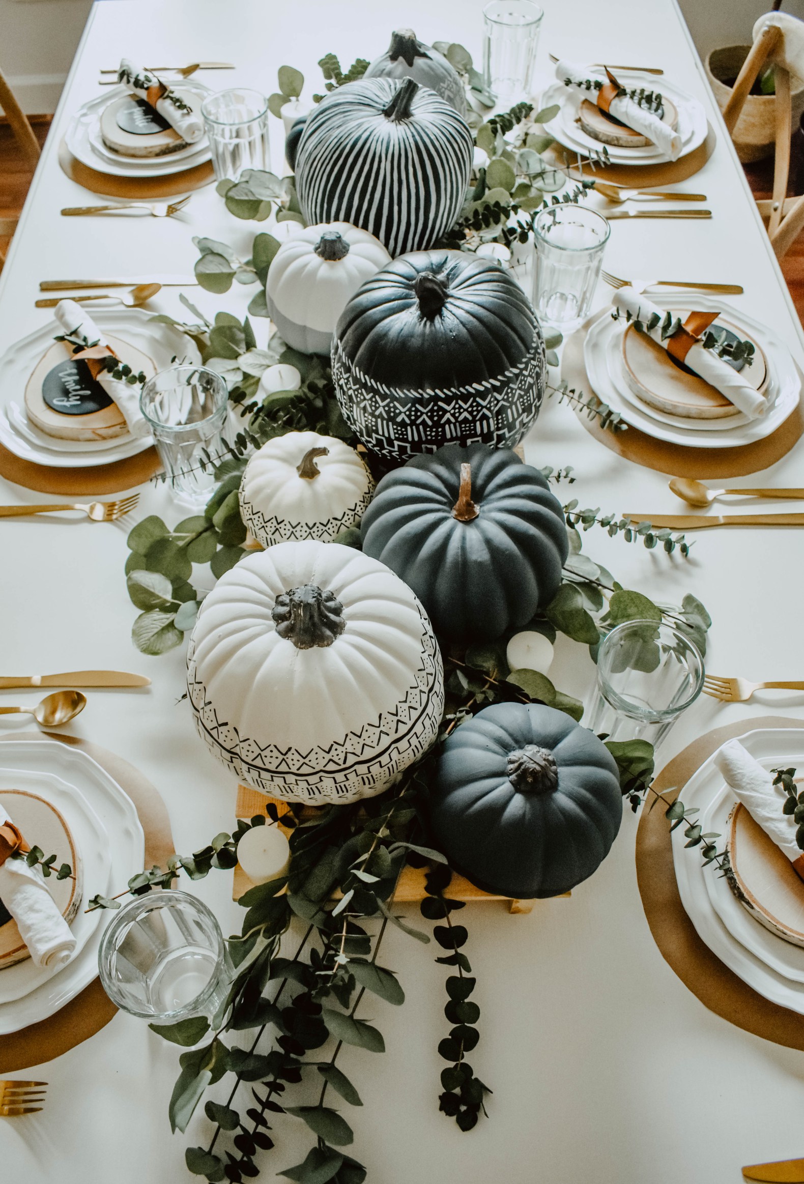 If your style is more boho modern, these DIY mud cloth painted pumpkins may be just what you need. Get creative by painting different patterns in a bold, consistent color scheme.