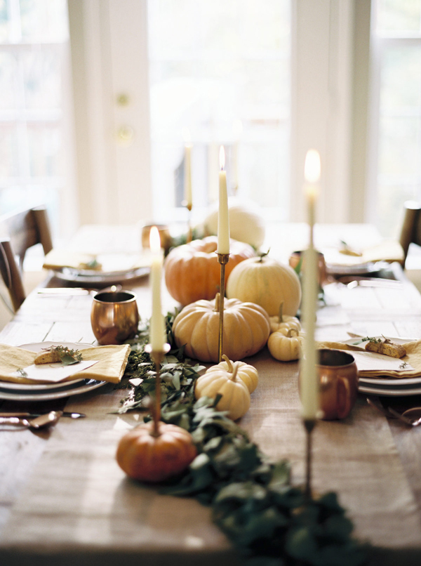 Give some height to your fall tablescape with a selection of gorgeous candlesticks. The key to this vintage-inspired look is to use candlesticks of varying sizes to give the look more dimension.