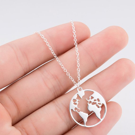 Travel Gifts: A necklace or bracelet adorned with a charm in the shape of a favorite state or country is a subtle nod to travel and a perfect accessory. Dainty jewelry, perfect for layering, is trendy and chic and can be dressed up or down for any occasion.