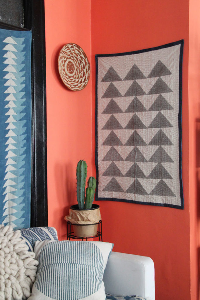 Coral Accent Wall / This one is for those of you who want to jump in with both feet. Use coral to bring a bright burst into your bedroom. If you’ve got a lot of other neutral, subtle colors in your scheme, adding a coral accent wall can really make your design scheme stand out. / Living Coral was named as Pantone’s 2019 Color of the Year! Here are 8 ways to add a dose of this chic, cheerful hue into your life. / theanastasiaco.com