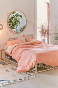 Coral Bedding / Changing your bedspread every now and then is a small change that can really freshen up the space. A coral bedspread with some fun accent pillows will give your bedroom a whole new look without breaking your budget. / Living Coral was named as Pantone’s 2019 Color of the Year! Here are 8 ways to add a dose of this chic, cheerful hue into your life. / theanastasiaco.com