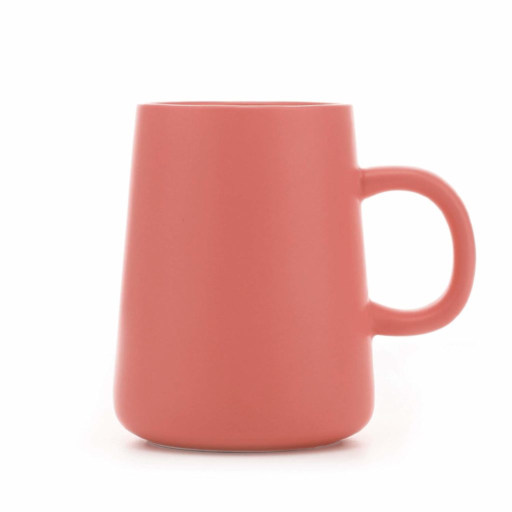 Coral Coffee Mug / It's not possible to have too many coffee mugs -  Add coral to your collection! This idea can be especially fun if you use open shelving or a coffee mug rack to display your mugs. / Living Coral was named as Pantone’s 2019 Color of the Year! Here are 8 ways to add a dose of this chic, cheerful hue into your life. / theanastasiaco.com