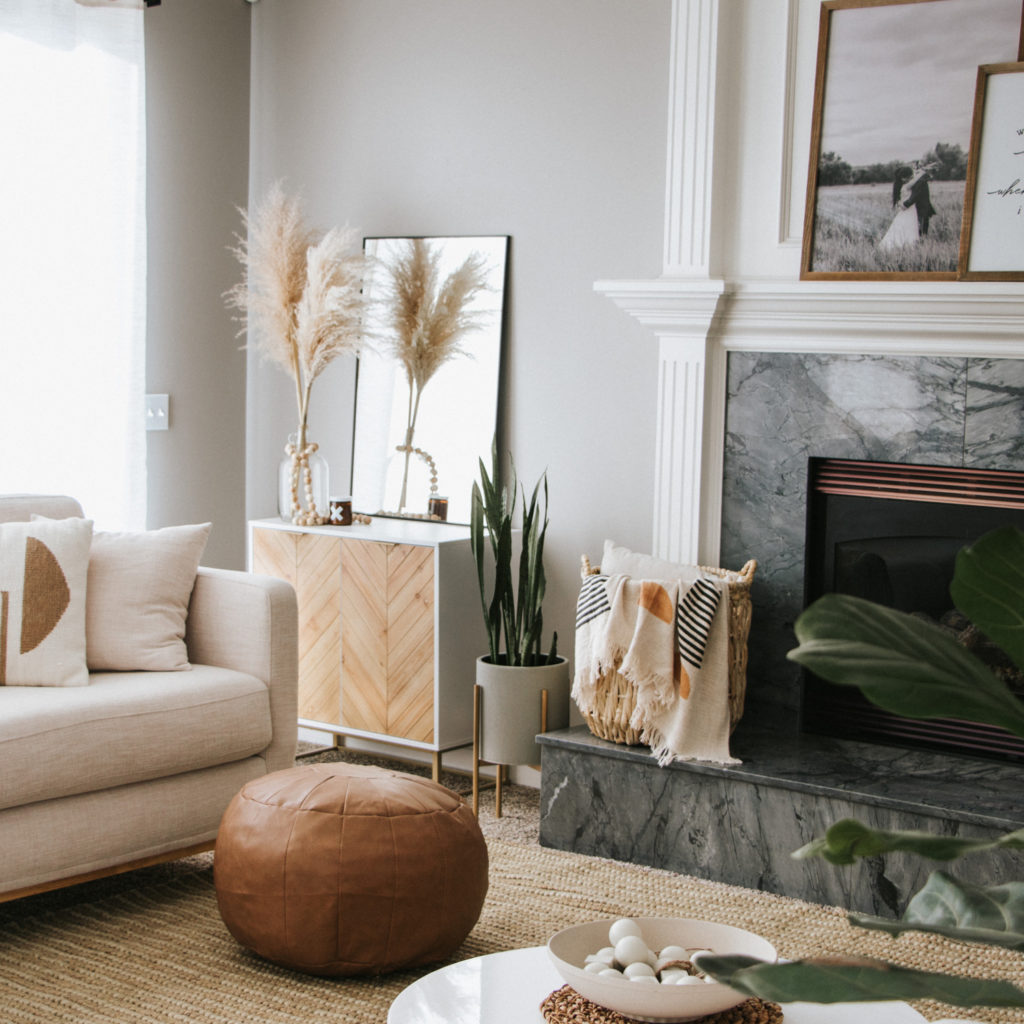 Nathan James Cabinet | See how our living room was transformed from a blank slate to a cozy, modern haven! Elegant and boho come together by mixing neutral and natural elements. Steal this look - home decor sources included! | The Anastasia Co