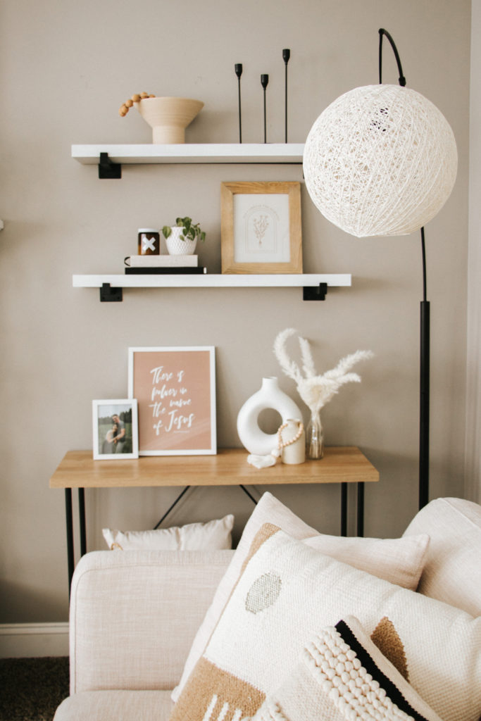 Shelf styling | Modern boho living room | Shelves over console table | The Anastasia Co