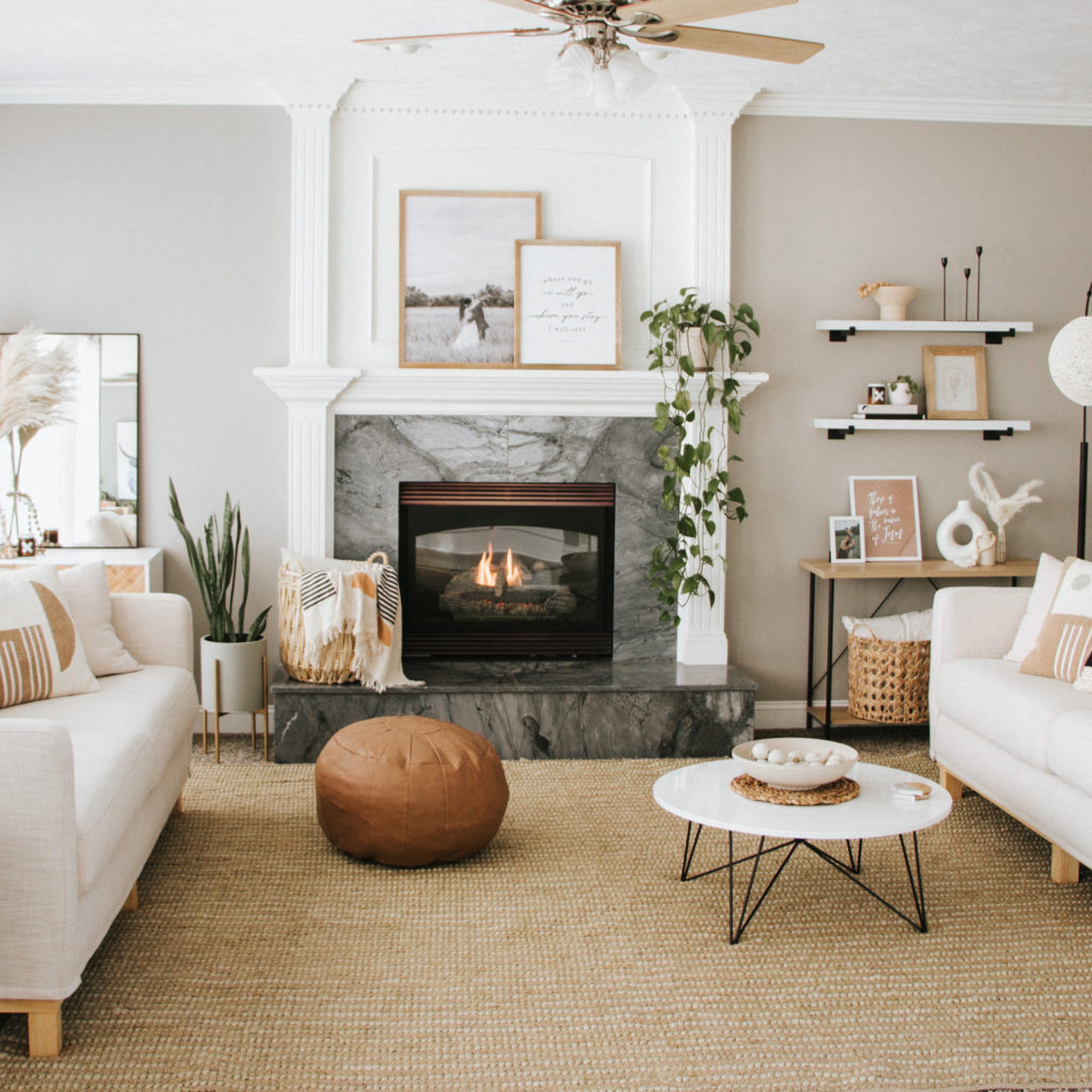 See how our living room was transformed from a blank slate to a cozy, modern haven! Elegant and boho come together by mixing neutral and natural elements. Steal this look - home decor sources included! | The Anastasia Co